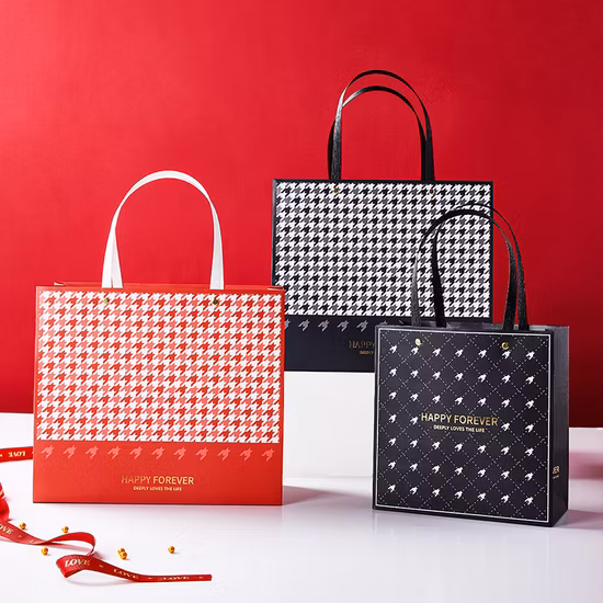 卸売高級黒靴衣類包装紙袋プリントカスタムロゴ衣類ショッピングギフトジュエリー包装紙袋